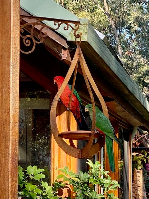 Inviting Nature: The Beauty and Benefits of Bird Baths and Bird Feeders