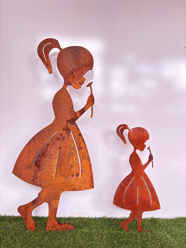 Girl Smelling Flower