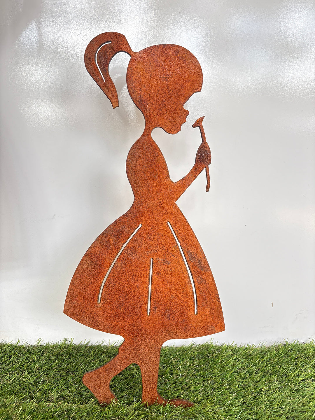 Girl Smelling Flower