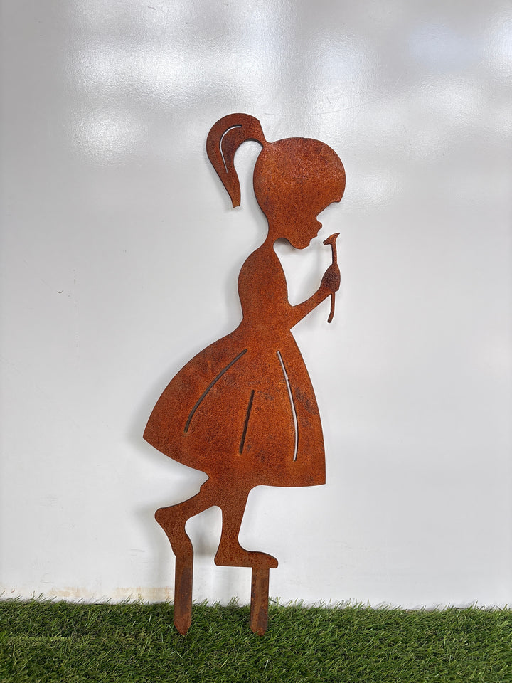 Girl Smelling Flower