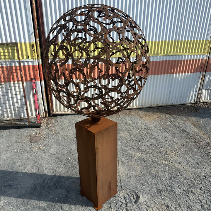 Fortune – Horseshoe Metal Sphere Sculpture on Plinth