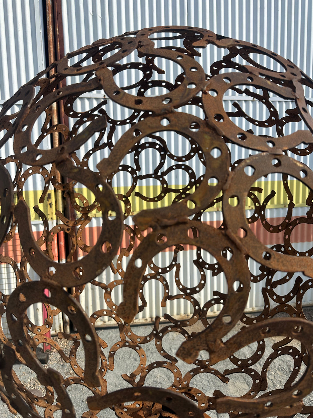 Fortune – Horseshoe Metal Sphere Sculpture on Plinth