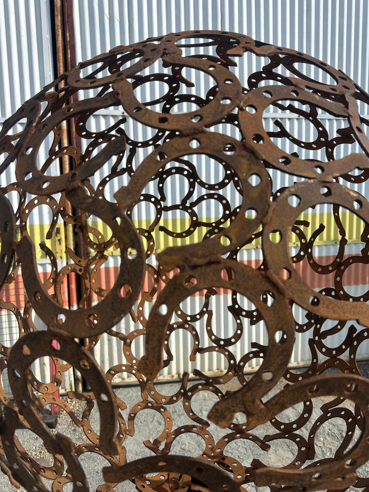 Fortune – Horseshoe Metal Sphere Sculpture on Plinth